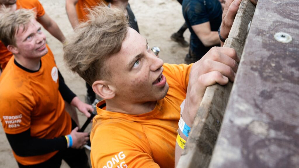 how to do a pull-up. man doing a pull-up at strong viking